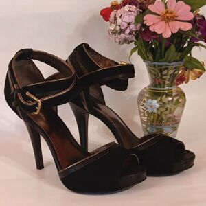 Coach Andrea Black and Gold Heels.